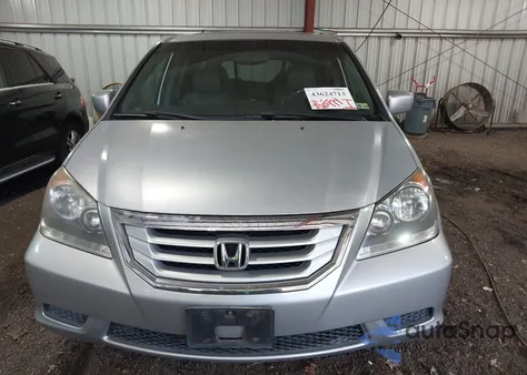 2010 Honda Odyssey Ex-L from USA, damaged, VIN 5FNRL3H71AB038244